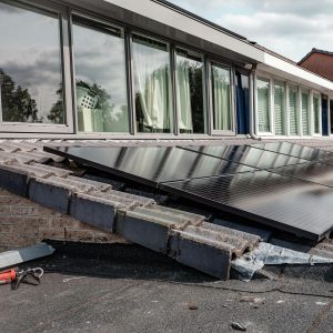 Rooftop solar panels on a modern house, optimizing energy efficiency.